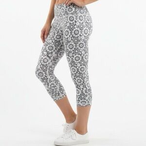 lululemon Women's Capri Leggings. Grey and white flower design.